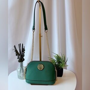 Elegant Green Crossbody Bag with Gold Chain and Medallion